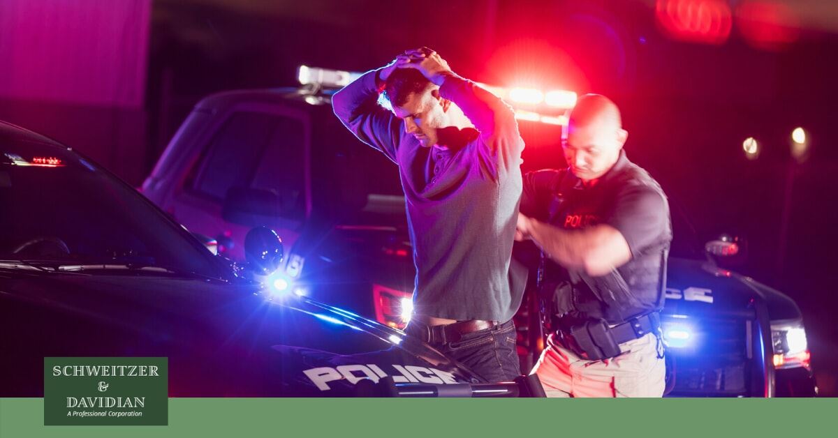 arrested hands over head police