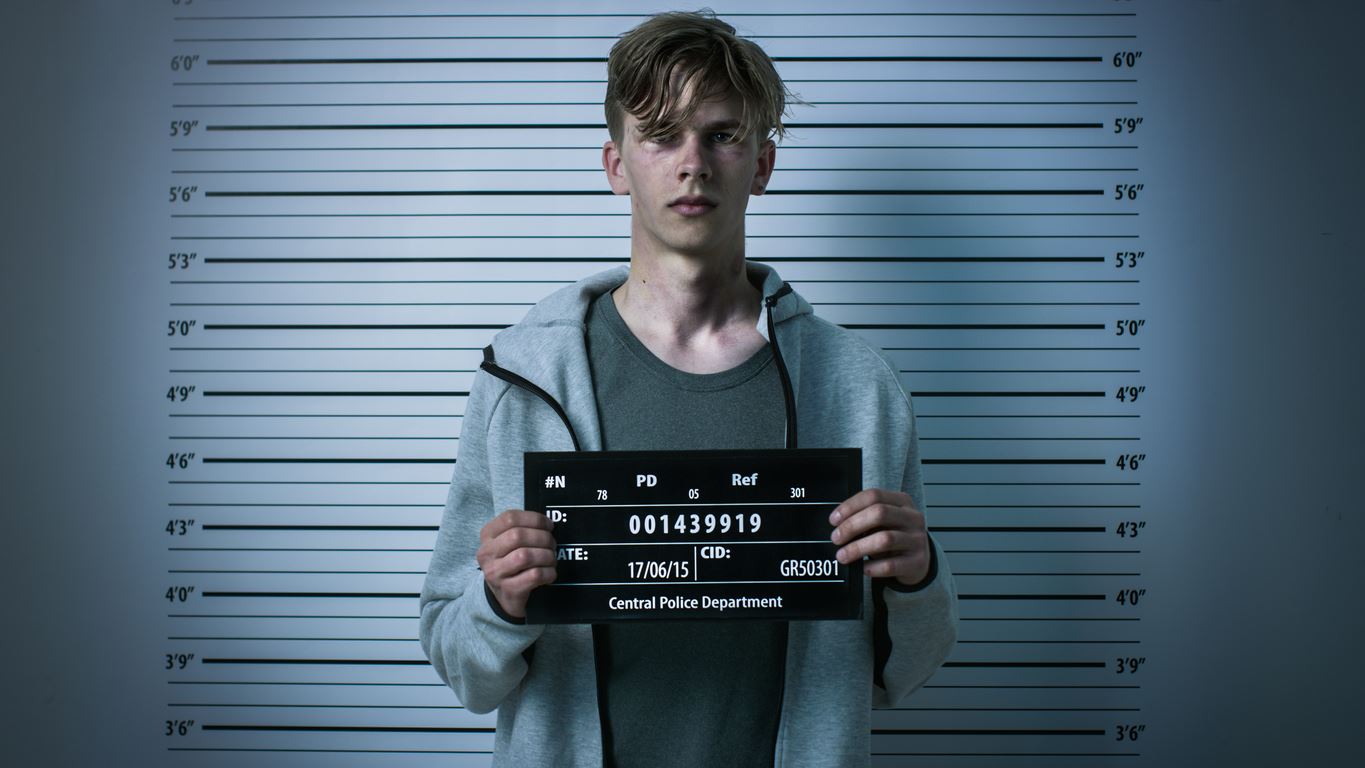 Teenage Posing for a Front View Mugshot